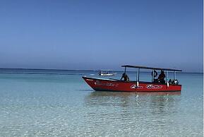 Seacret Studios - Cozy Jamaican Retreat Apts by RedAwning