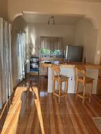 Seacret Studios - Cozy Jamaican Retreat Apts by RedAwning