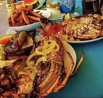 Seacret Studios - Cozy Jamaican Retreat Apts by RedAwning