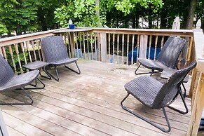 Rapid City Cottage w/ Deck: 1/4 Mi to Torch Lake!