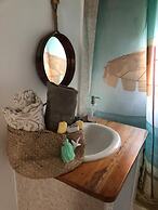 Seacret Studios - Cozy Jamaican Retreat Apts by RedAwning