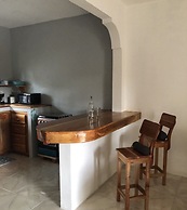 Seacret Studios - Cozy Jamaican Retreat Apts by RedAwning