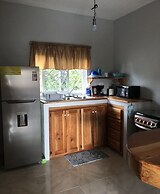 Seacret Studios - Cozy Jamaican Retreat Apts by RedAwning