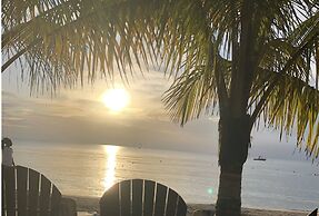 Seacret Studios - Cozy Jamaican Retreat Apts by RedAwning