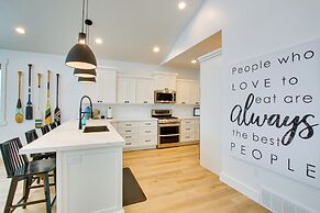 Pool Access & Lake Views: Modern Garden City Home