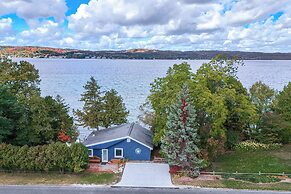 Waterfront Suttons Bay Cottage w/ Fire Pit!
