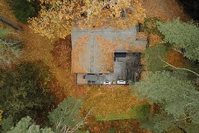 Modern Riverfront Cabin: Poconos Woodland Escape