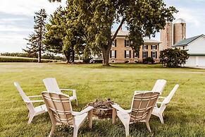 Spacious Farmhouse on 200 Acres Along the River