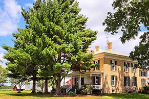 Spacious Farmhouse on 200 Acres Along the River