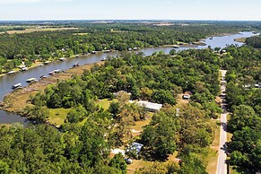 Riverfront Magnolia Springs Cabin Rental w/ Grill