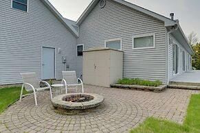 Lakefront De Tour Village Home w/ Deck & Fire Pit!