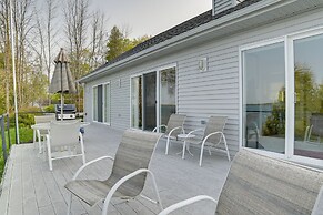 Lakefront De Tour Village Home w/ Deck & Fire Pit!