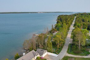 Lakefront De Tour Village Home w/ Deck & Fire Pit!