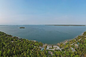 Lakefront De Tour Village Home w/ Deck & Fire Pit!