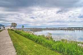 Lakefront De Tour Village Home w/ Deck & Fire Pit!