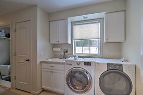 Lakefront De Tour Village Home w/ Deck & Fire Pit!