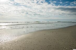 Beach Getaway w/ Pool Access + Patio w/ Ocean View