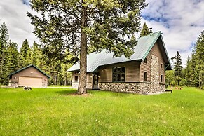 Secluded Bigfork Cabin w/ Huge Yard + Grill!