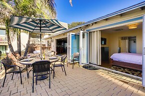Tropical Oceanside Home w/ Deck, Walk to Beach