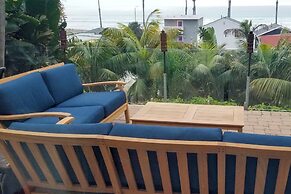 Tropical Oceanside Home w/ Deck, Walk to Beach