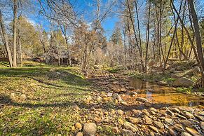 Cozy Cabin Retreat w/ Patio & Fenced Yard