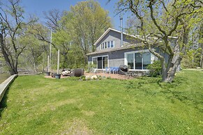 Spacious Delton Home w/ Fire Pit + Lake Views