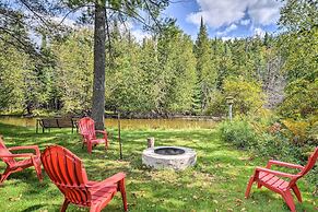 Riverfront Traverse City Cabin Near Snowmobiling!