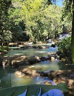 Seacret Studios - Cozy Jamaican Retreat Apts by RedAwning