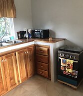 Seacret Studios - Cozy Jamaican Retreat Apts by RedAwning