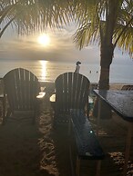 Seacret Studios - Cozy Jamaican Retreat Apts by RedAwning