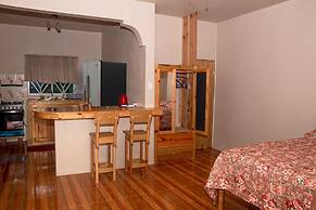 Seacret Studios - Cozy Jamaican Retreat Apts by RedAwning