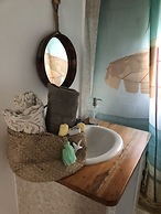 Seacret Studios - Cozy Jamaican Retreat Apts by RedAwning