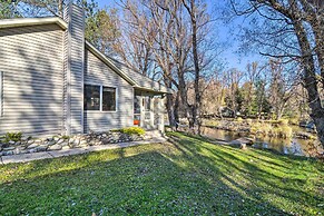 Riverfront Grayling Retreat w/ Fire Pit & Dock!