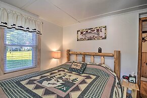 Riverfront Grayling Retreat w/ Fire Pit & Dock!