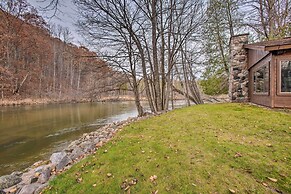 Riverfront Manton Cabin w/ Pool Table & Fire Pit!
