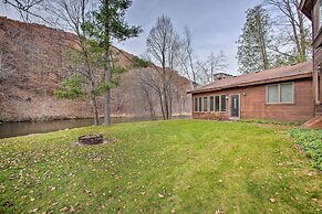 Riverfront Manton Cabin w/ Pool Table & Fire Pit!