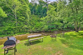 Porch & On-site Creek: Marshall Cabin Retreat