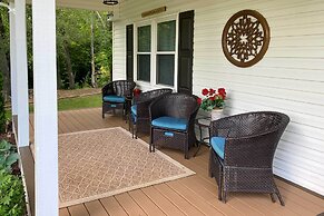 Quaint Creekside Cottage w/ Porch & Backyard!