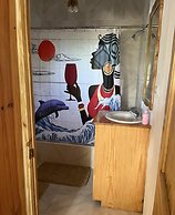 Seacret Studios - Cozy Jamaican Retreat Apts by RedAwning