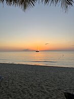 Seacret Studios - Cozy Jamaican Retreat Apts by RedAwning