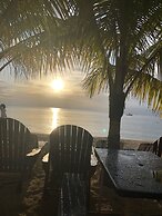 Seacret Studios - Cozy Jamaican Retreat Apts by RedAwning