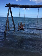 Seacret Studios - Cozy Jamaican Retreat Apts by RedAwning