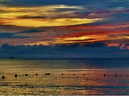 Seacret Studios - Cozy Jamaican Retreat Apts by RedAwning