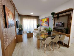 Apartamento 2 suítes lindo e vista mar