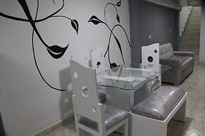 Apartahotel Tia Inés