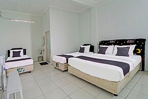 Capital O 91466 Hotel Neu Backpacker Tf Syariah (smk Tb)