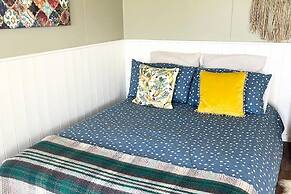 1br-sleeps2-field View-parking-cabin Experience