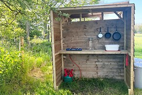 1br-sleeps2-field View-parking-cabin Experience