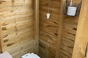 1br-sleeps2-field View-parking-cabin Experience