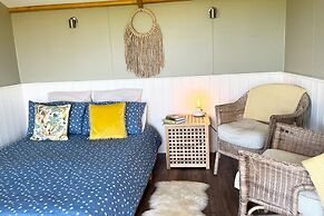 1br-sleeps2-field View-parking-cabin Experience